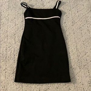 Tight black dress with white stripes